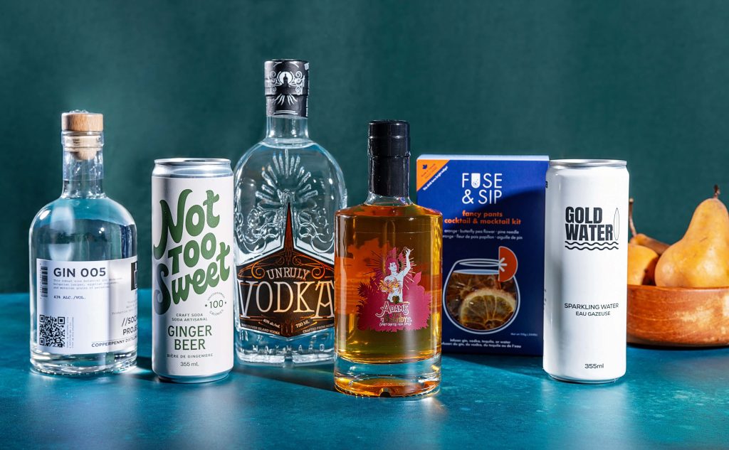 A lineup of B.C. distilled spirits and locally made mixers for making festive cocktails. 